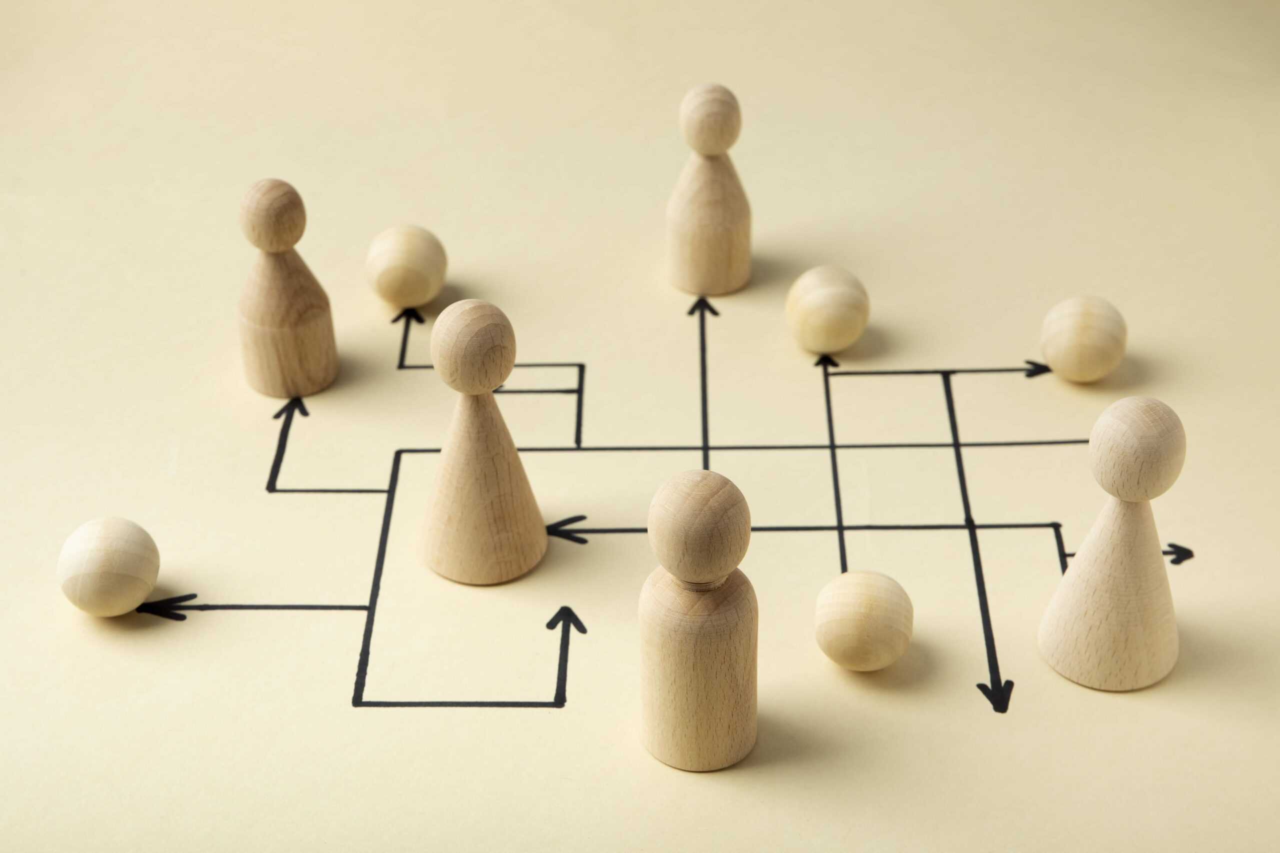 high-angle-wooden-pawns-arrangement